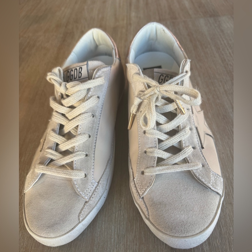 Golden Goose sneakers.New no box never worn. Had foot surgery,shoes do not fit.